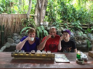 Denise drinking the "Luwak" coffee...