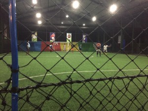 Carter playing Futsal with the locals