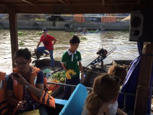 Little boy selling his produce