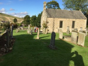 The Church and graves are set to the left